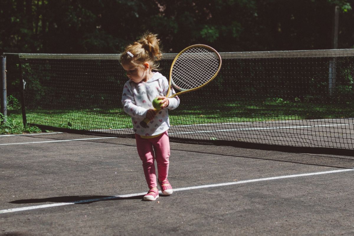 little girl playing sport